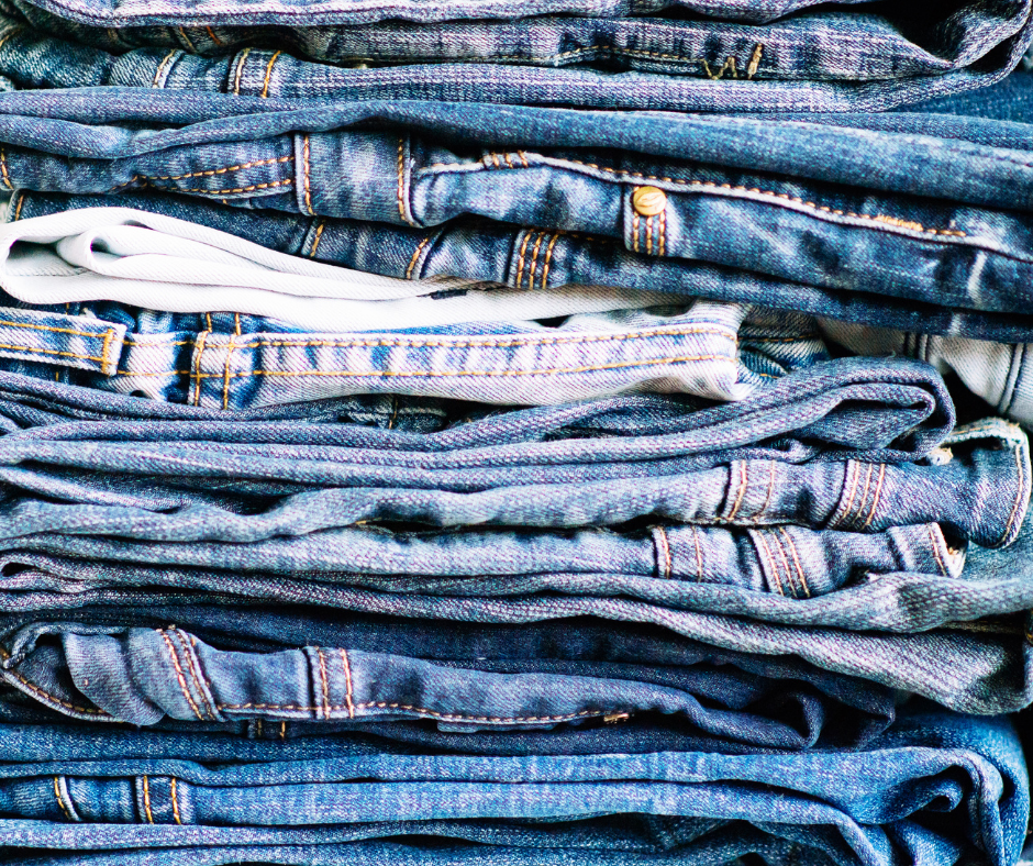 How do I care for my jeans? Pile of assorted blue denim items such as jeans